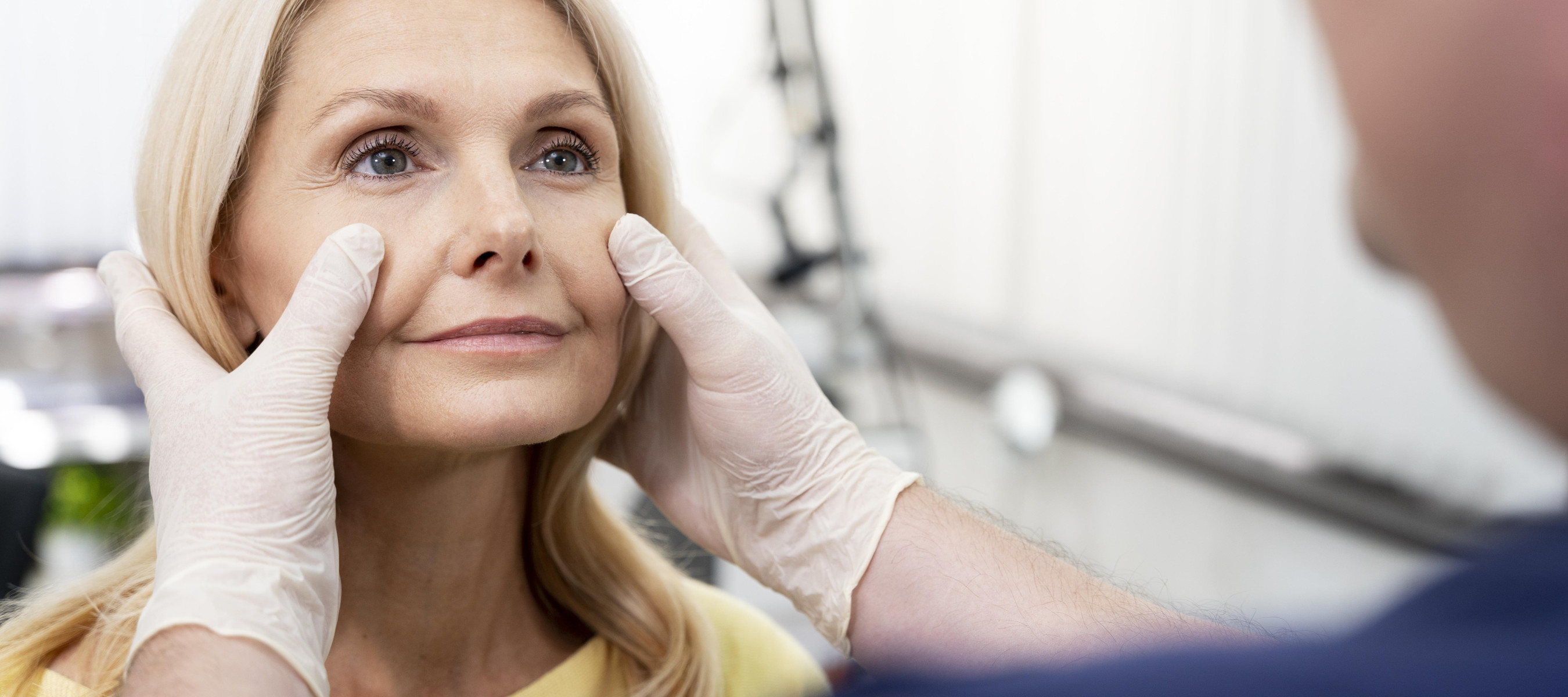 Older lady getting facelift consultation