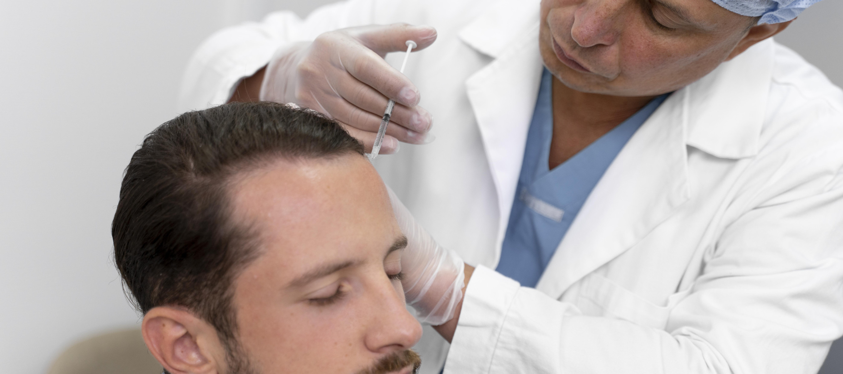 doctor inject local anesthesia for follicular unit extraction