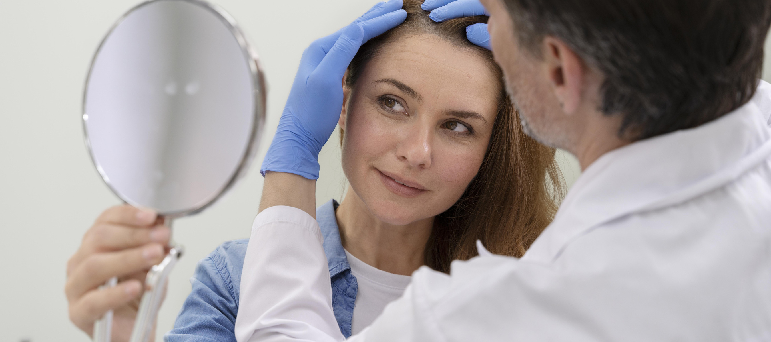Woman getting hair consultation