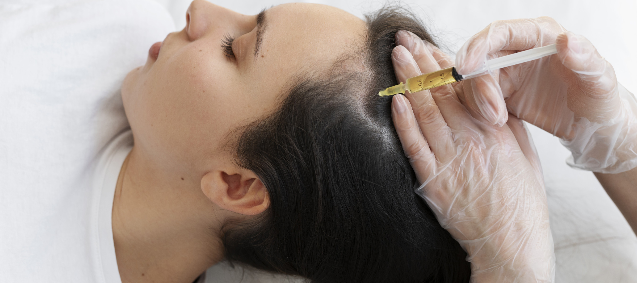 Woman getting sculp injection